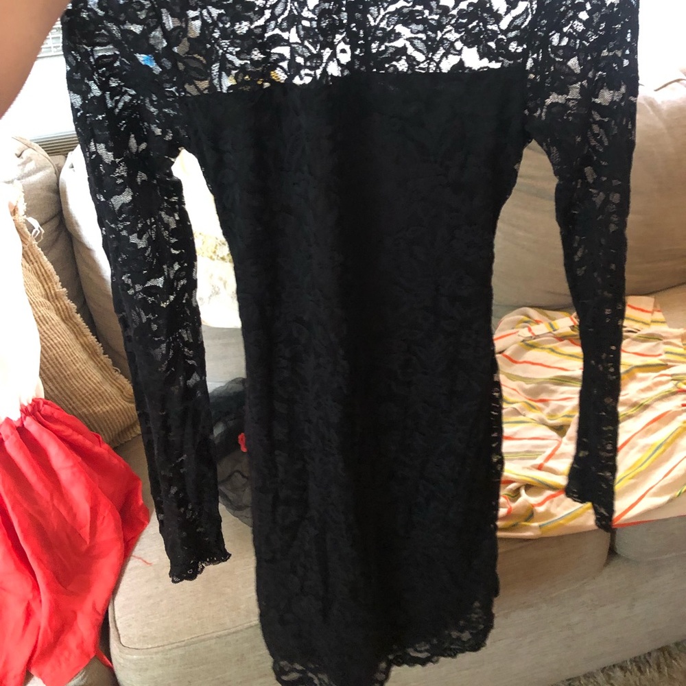 Black lace knee length fitted dress, long sleeve